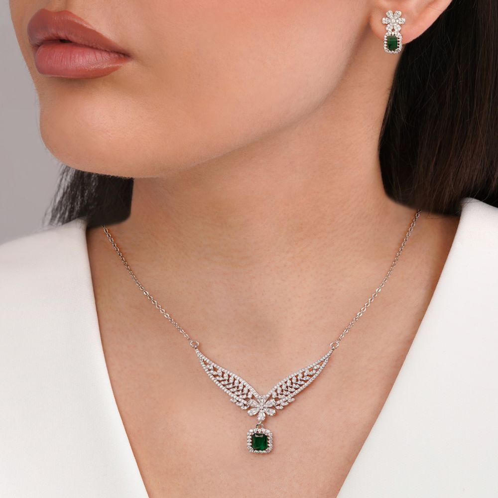 تصویر نیم ست جواهری نگین سبز تیتانیوم نقره ای