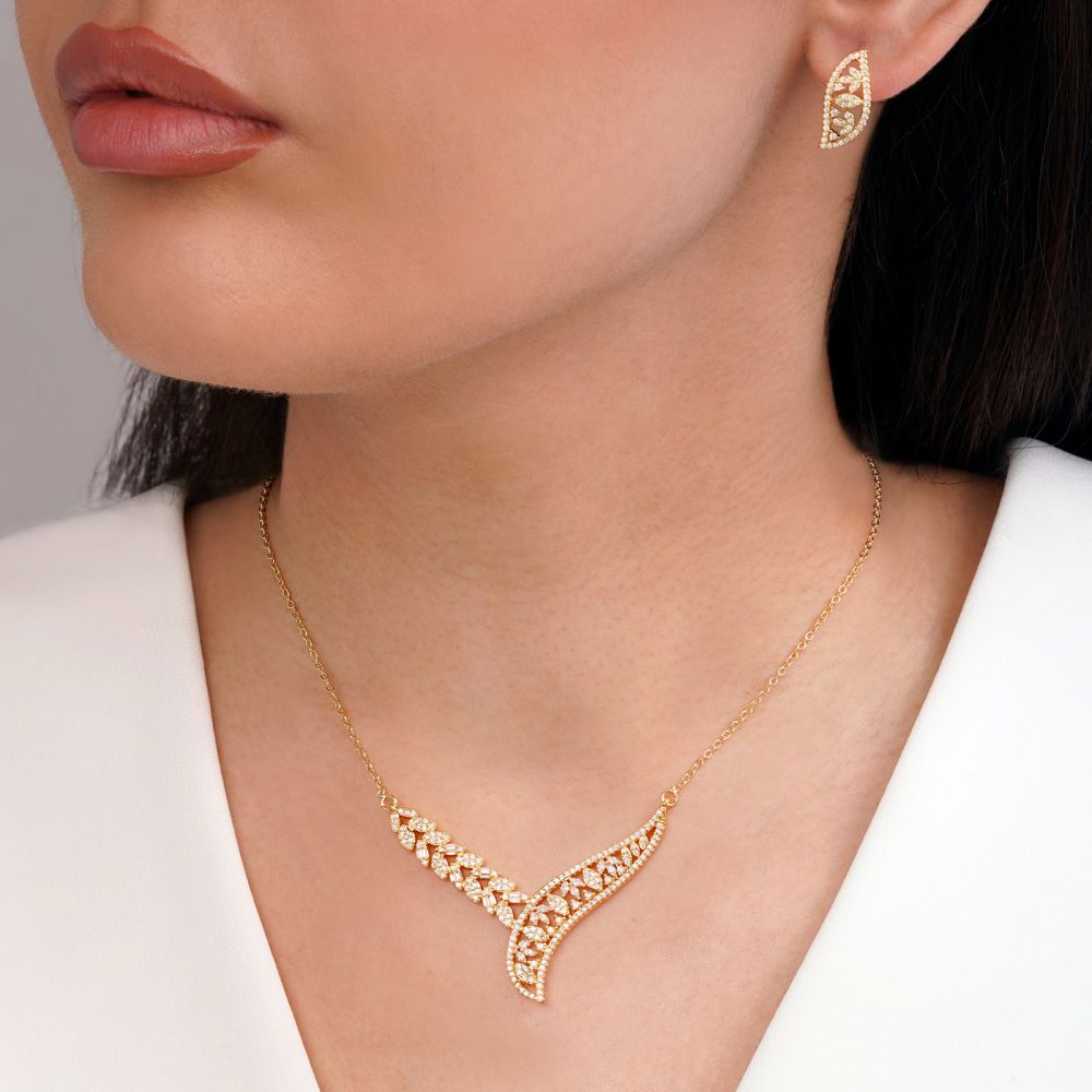 تصویر نیم ست جواهری نگین سفید تیتانیوم طلایی