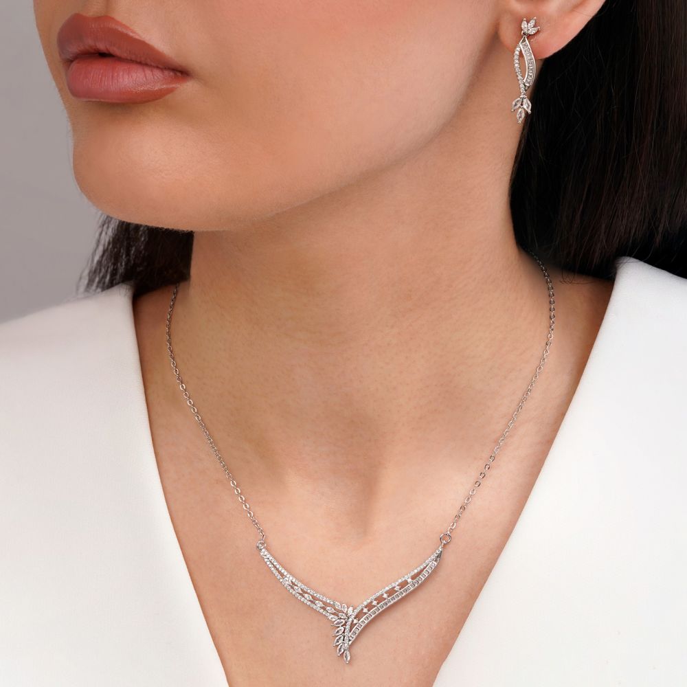 تصویر نیم ست جواهری نگین سفید تیتانیوم نقره ای