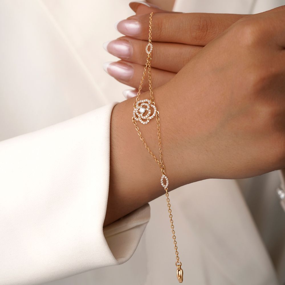 تصویر دستبند شوپینگ گل نگین دار طلایی