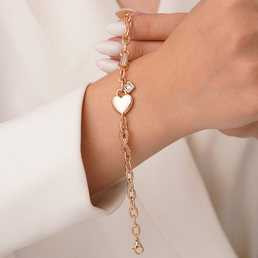 تصویر دستبند شوپینگ قلب نگین دار طلایی