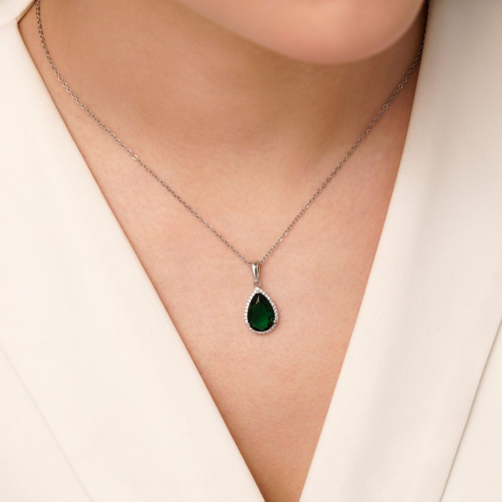 تصویر پلاک شوپینگ نگین سبز سفید