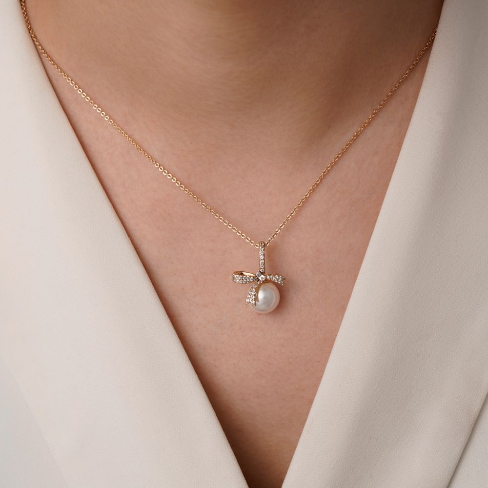 تصویر پلاک شوپینگ نگین دار مرواریدی 16میل طلایی