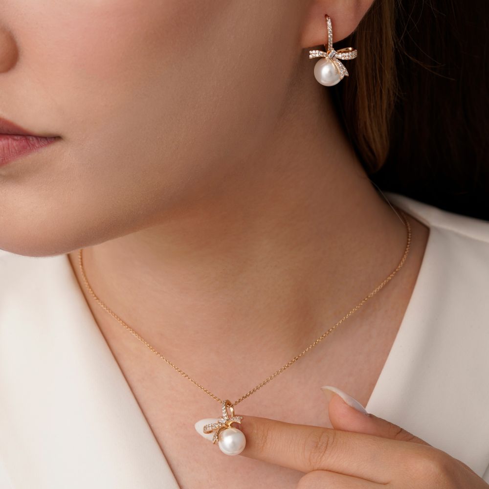 تصویر نیم ست شوپینگ نگین مرواریدی طلایی