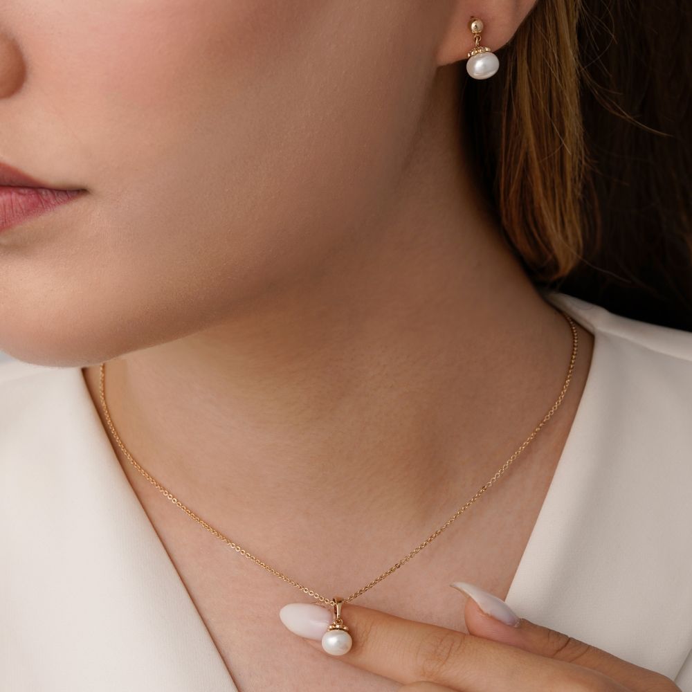 تصویر نیم ست شوپینگ پلاک دار مرواریدی طلایی