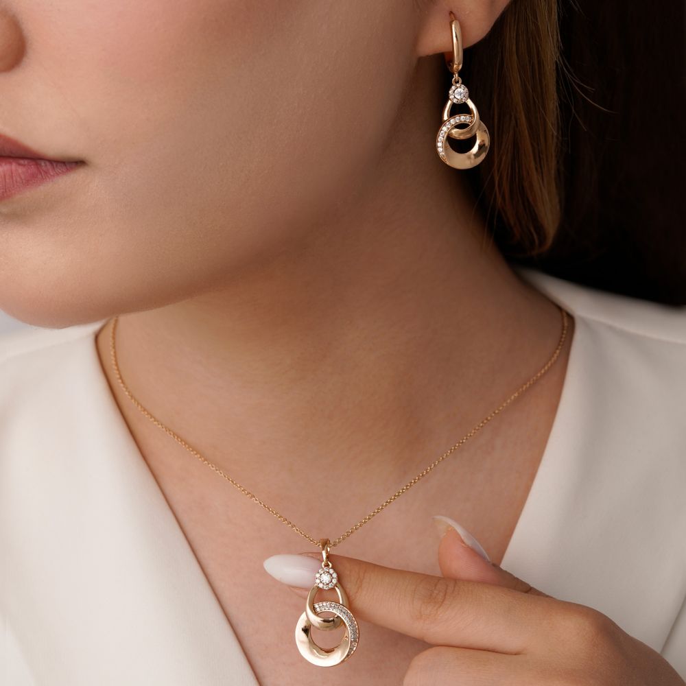 تصویر نیم ست شوپینگ کارتیر نگین دار طلایی