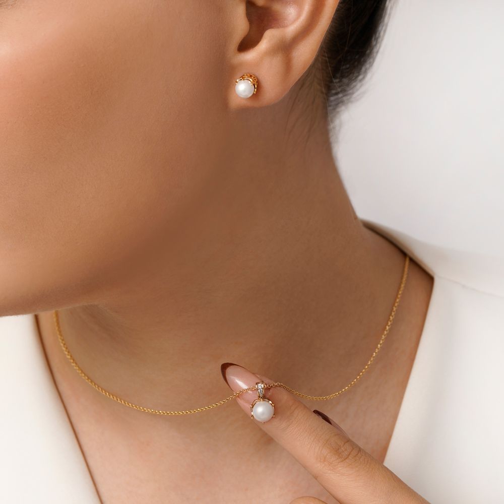 تصویر نیم ست شوپینگ پلاک دار مرواریدی طلایی