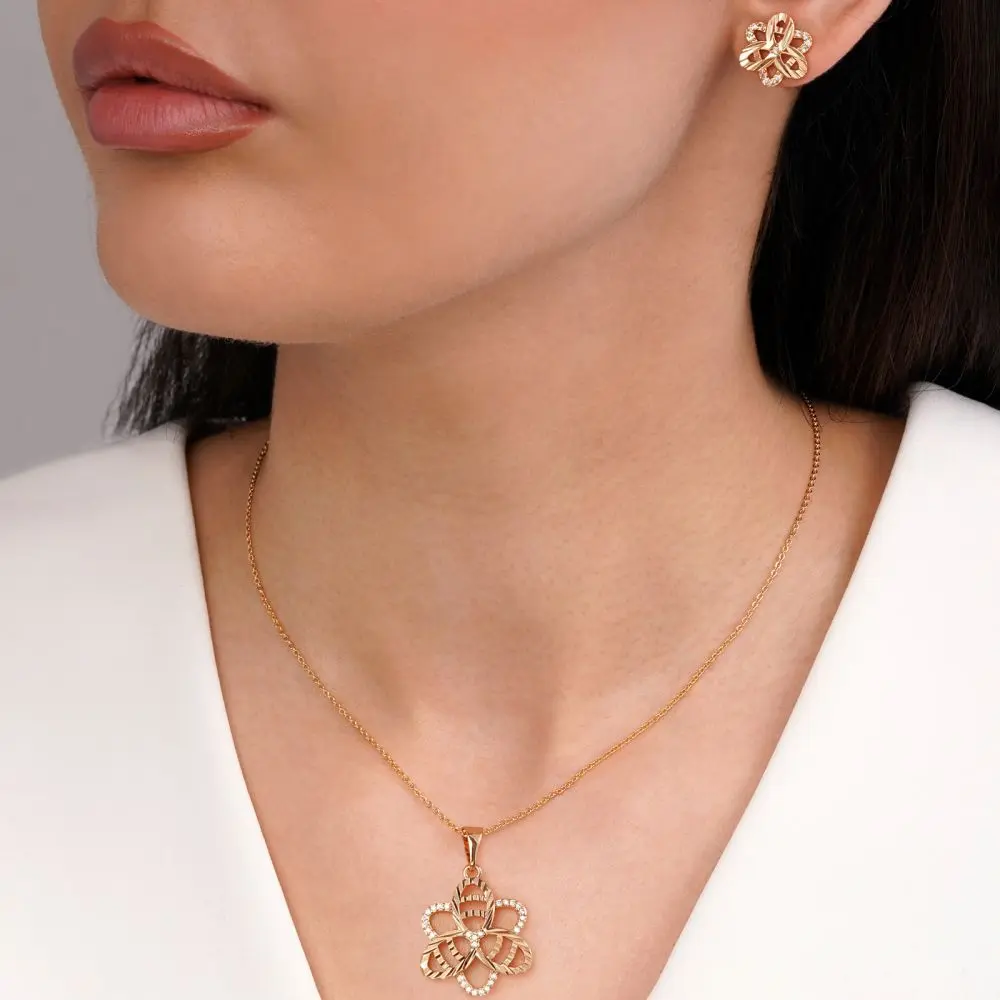 تصویر نیم ست گل  نگین دار طلایی شوپینگ