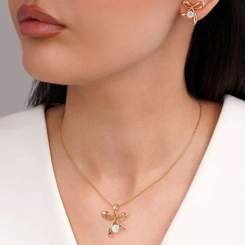 تصویر نیم ست پاپیون نگین دار طلایی شوپینگ