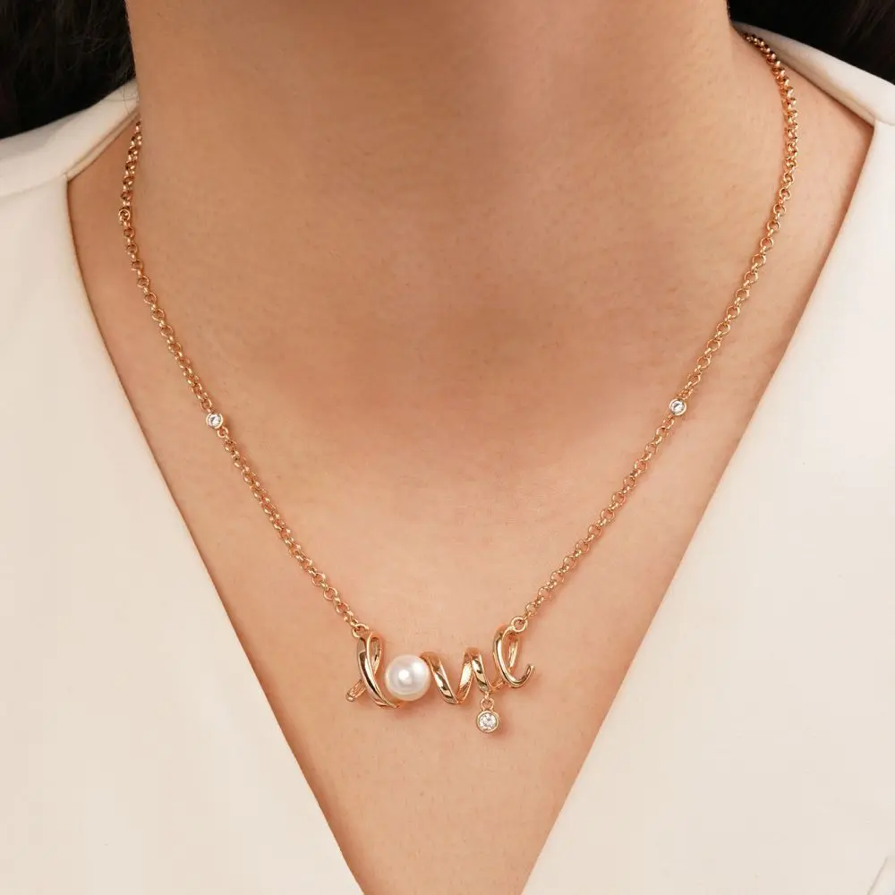 تصویر گردنبند مرواریدی طلایی شوپینگ 