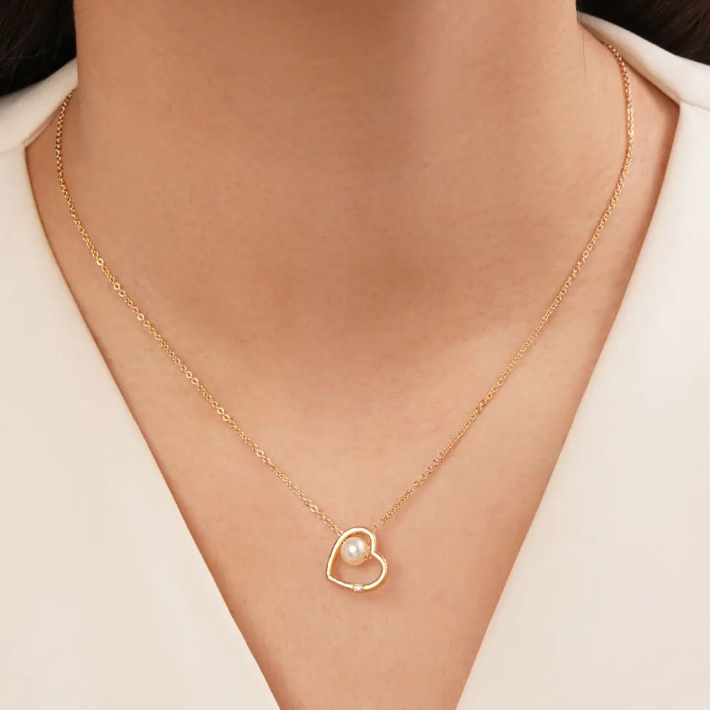 تصویر گردنبند قلب مرواریدی طلایی شوپینگ