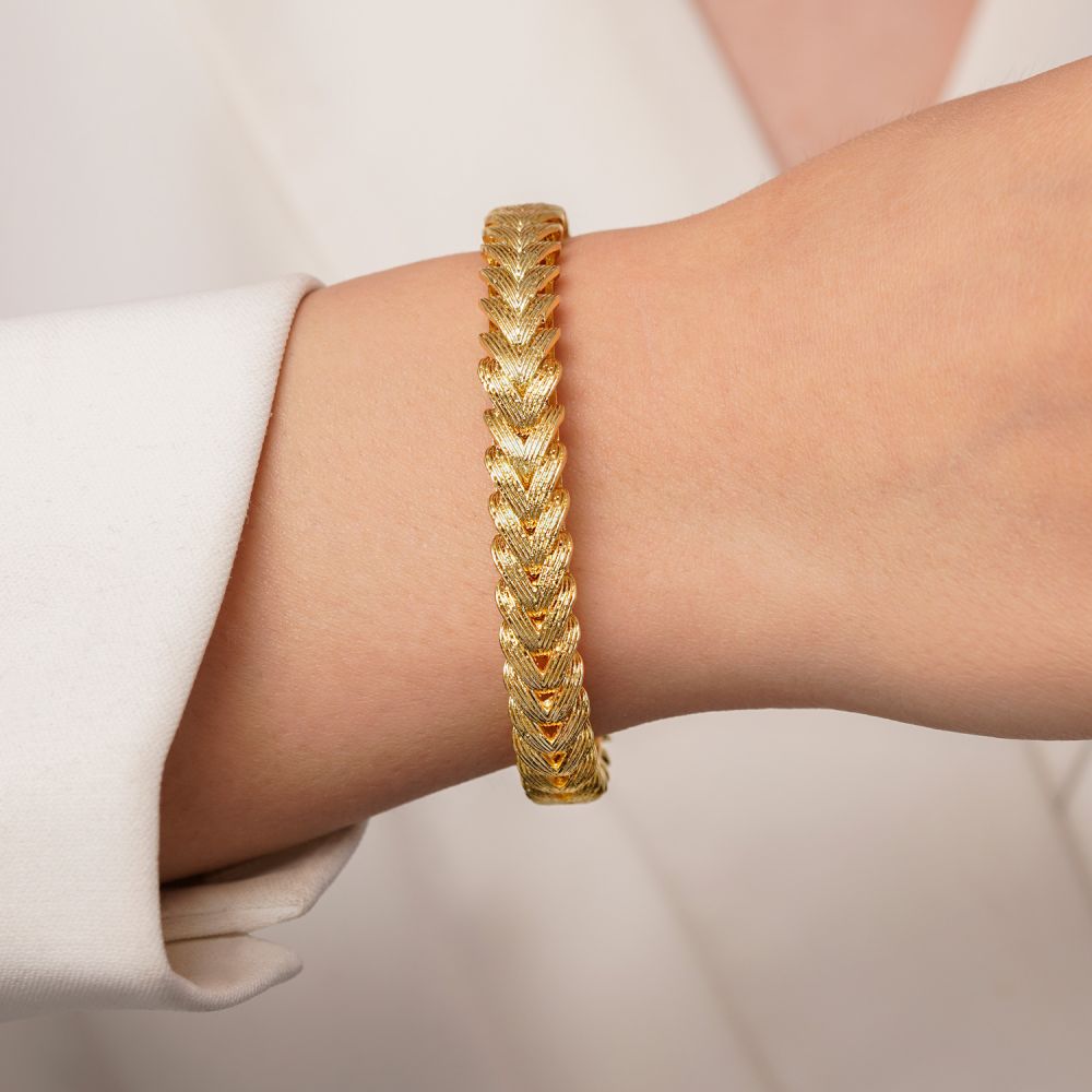 تصویر دستبند النگویی رادیوم طرح دار طلایی (فری سایز)