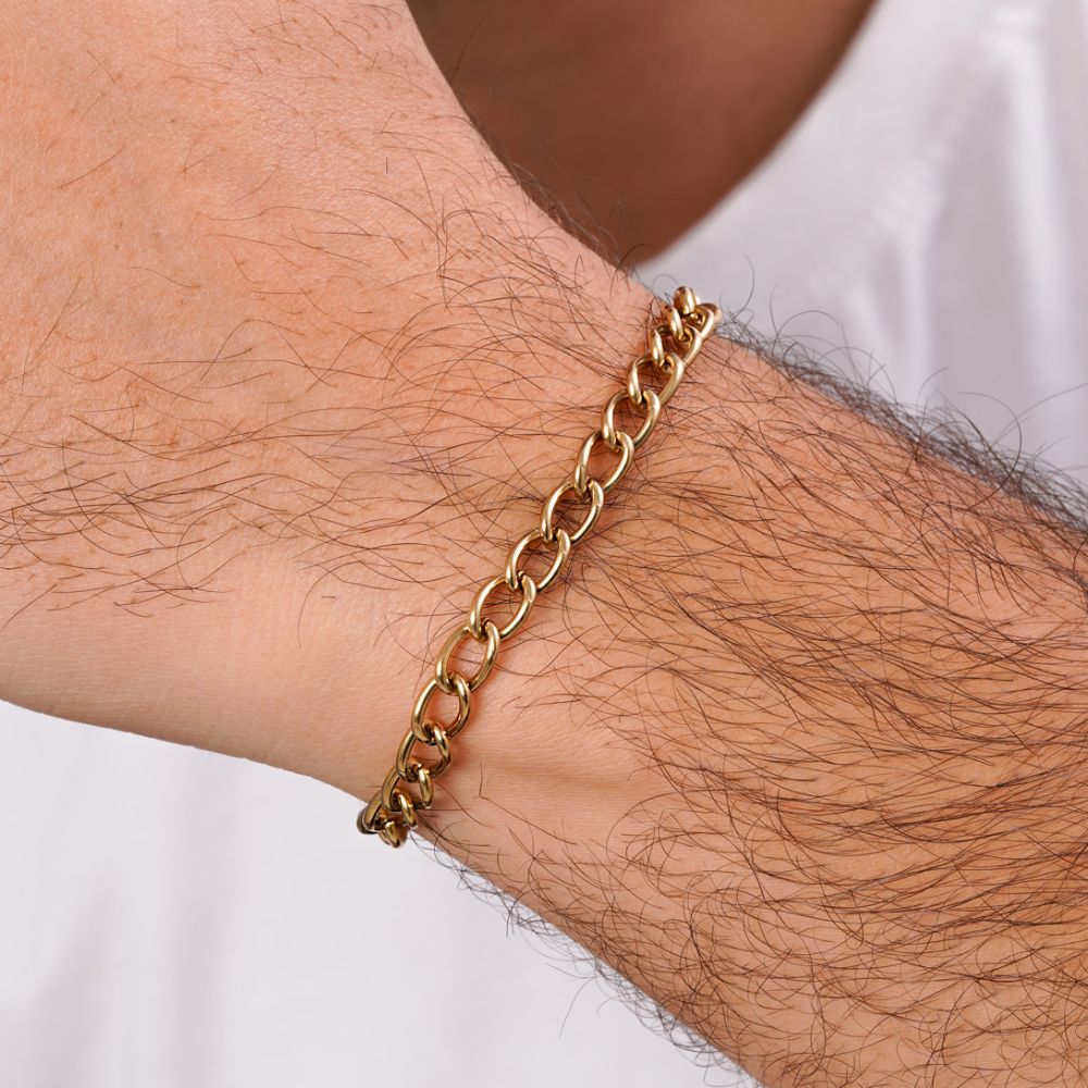 تصویر دستبند استیل کارتیر طلایی