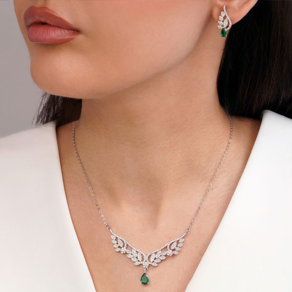 تصویر نیم ست جواهری نگین سبز تیتانیوم نقره ای