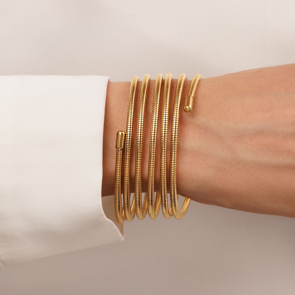 تصویر دستبند النگویی استیل 316 چند لاین طلایی