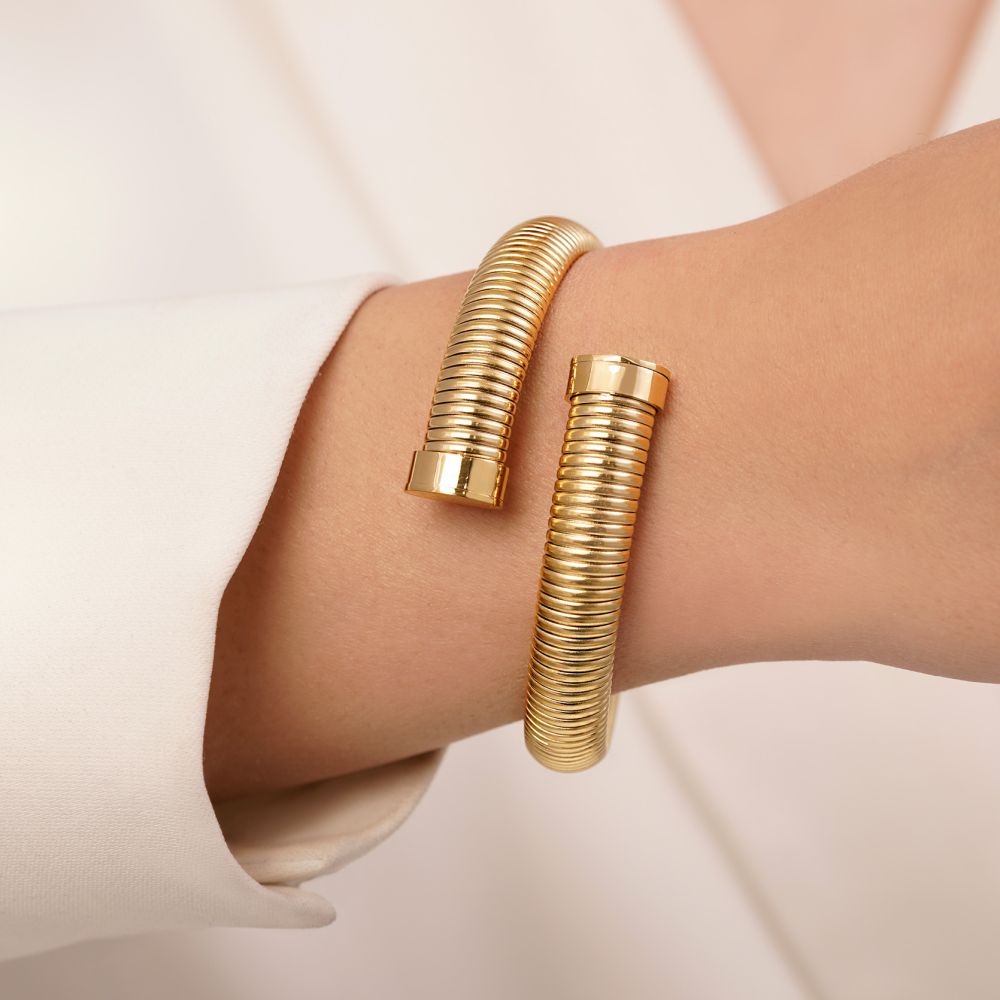 تصویر دستبند النگویی استیل 316 طرح دار طلایی(فری سایز)