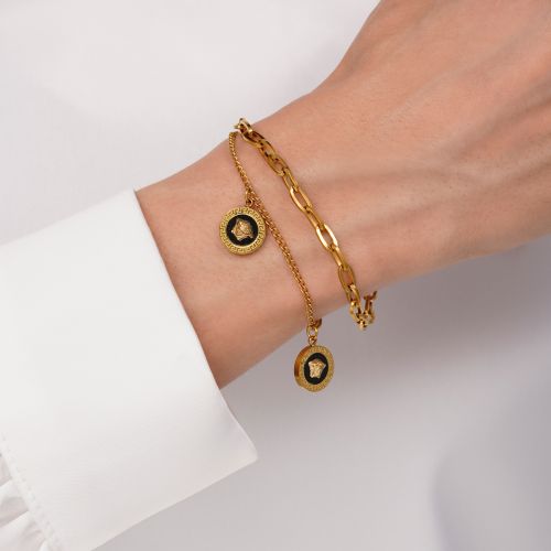 دستبند ورساچه مشکی استیل طلایی 