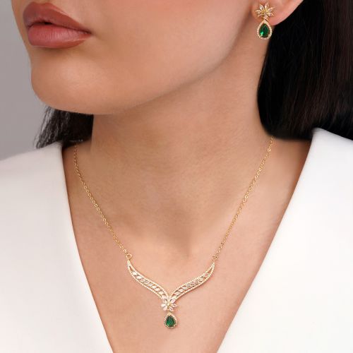 نیم ست جواهری نگین سبز تیتانیوم طلایی