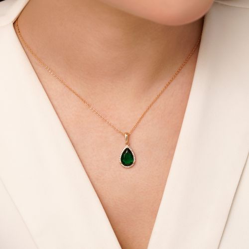 پلاک شوپینگ نگین سبز طلایی