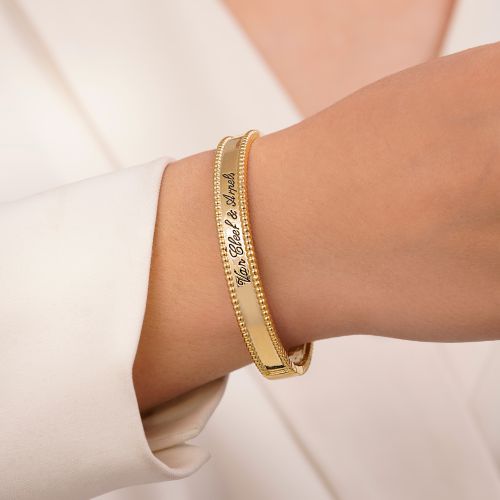 دستبند النگویی TRENDY ونکلیف طرح امضاء های کپی طلایی