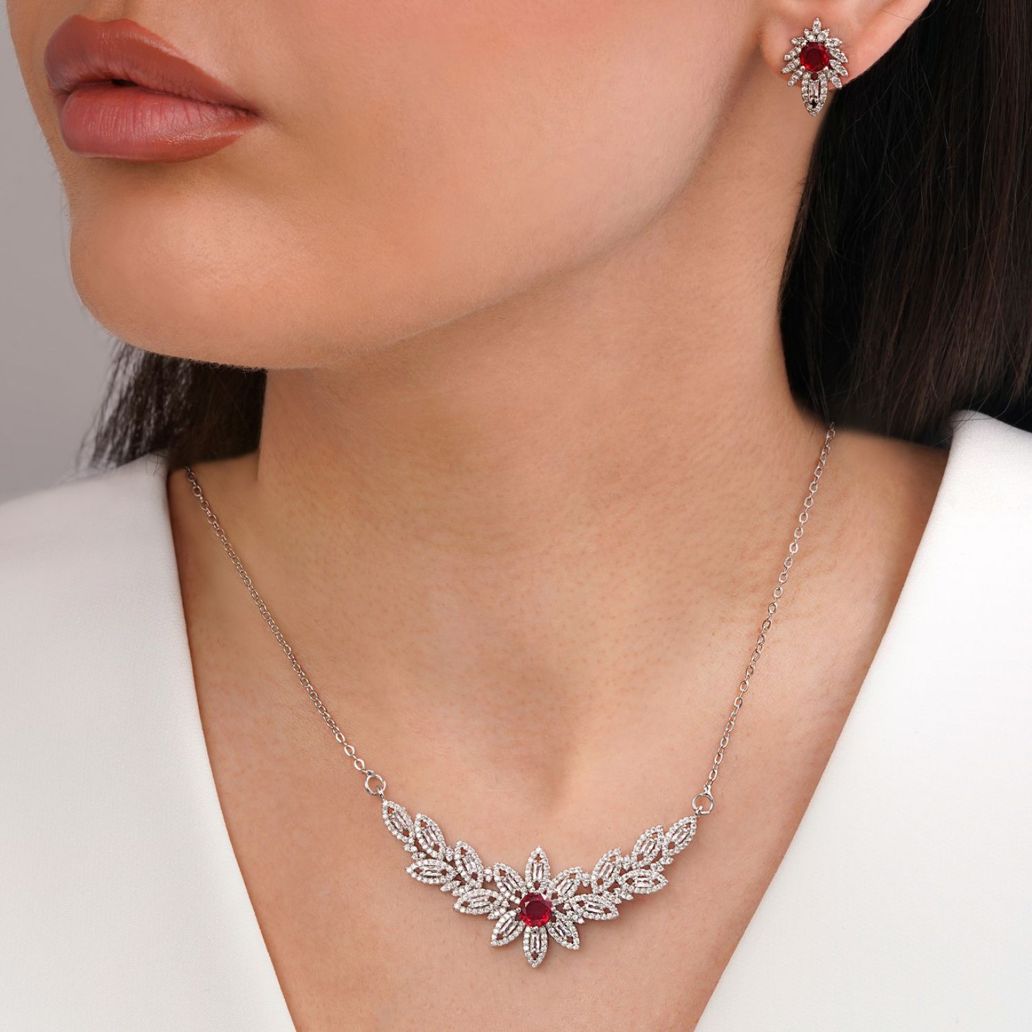 نیم ست جواهری نگین قرمز تیتانیوم نقره ای