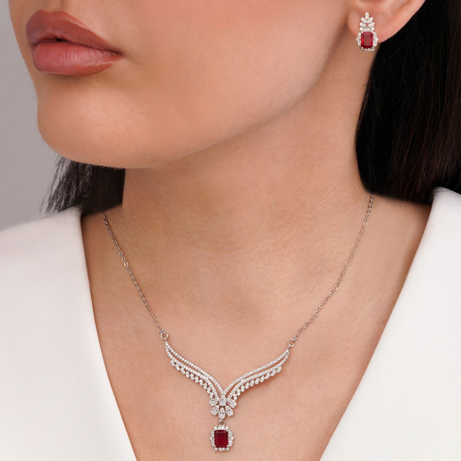 نیم ست جواهری نگین قرمز تیتانیوم نقره ای