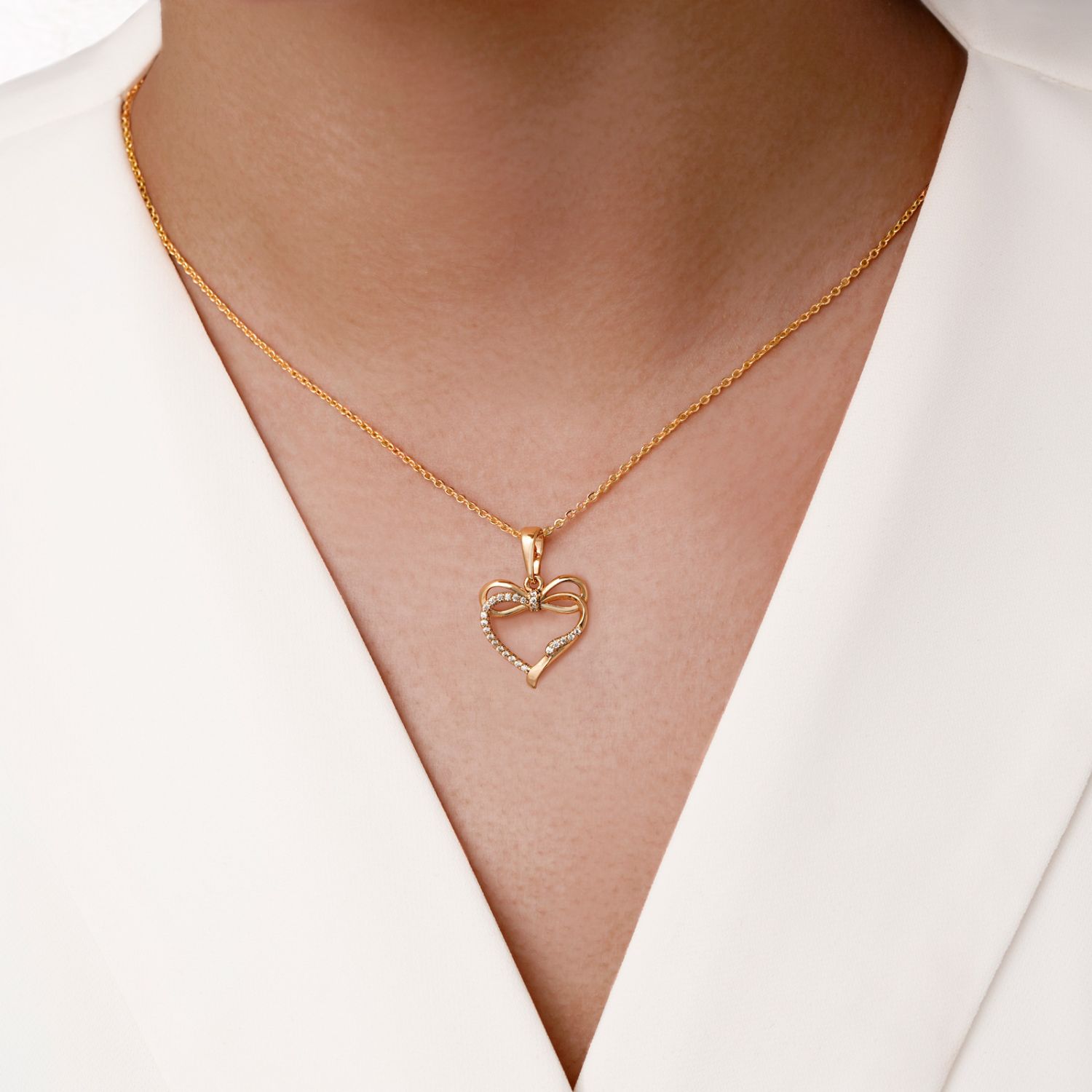 پلاک شوپینگ قلب نگین دار 15.8 میل طلایی