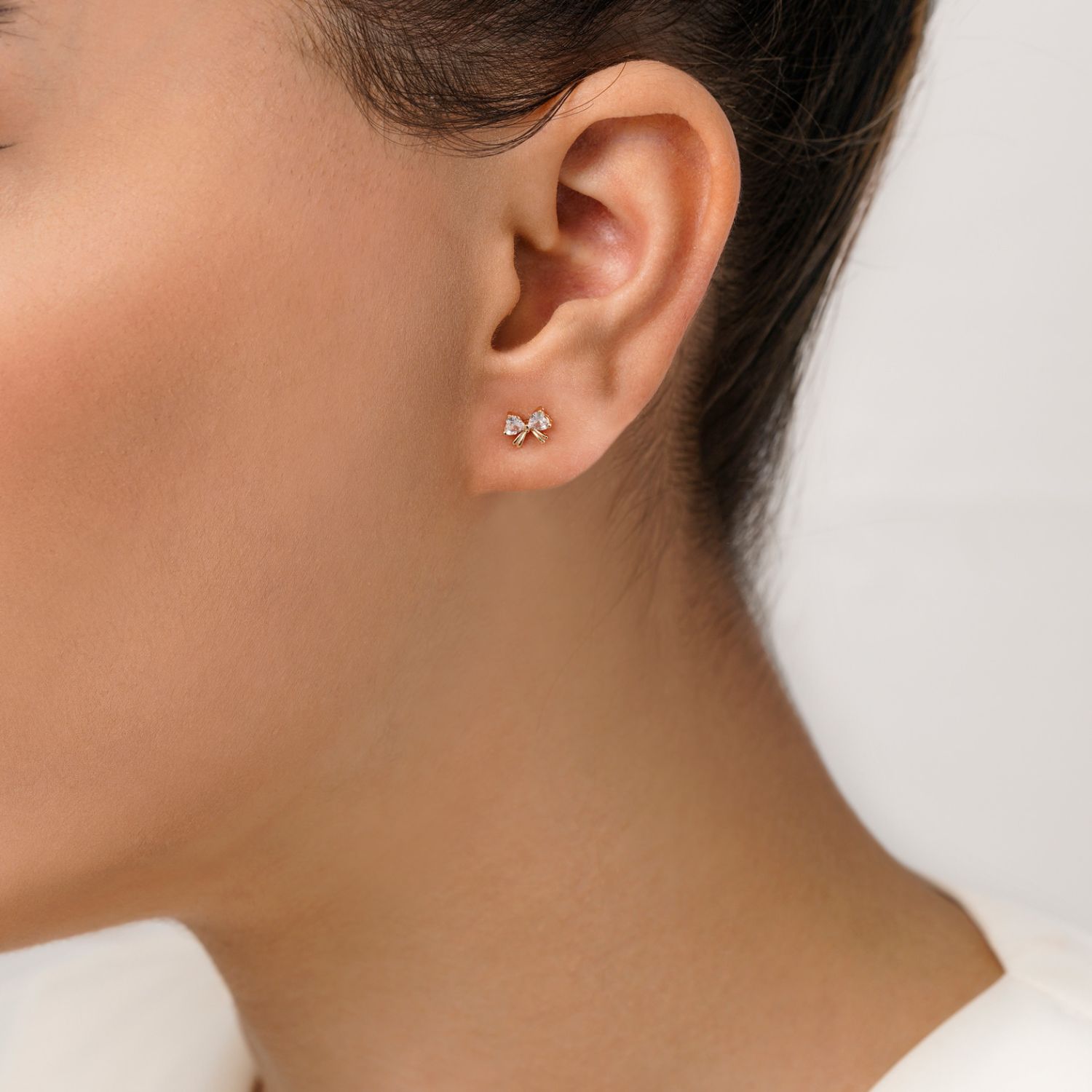 گوشواره شوپینگ میخی پاپیون طلایی