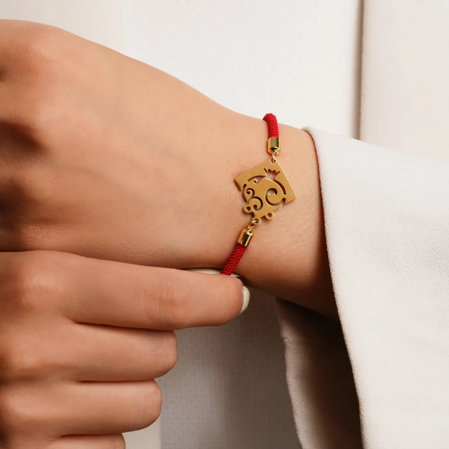 دستبند نخی انار پلاک استیل