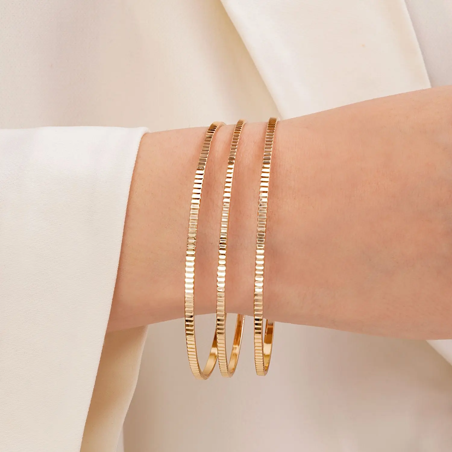 النگو زنانه سایز 3 ضمانتی 2میل طلایی(بسته3عددی)