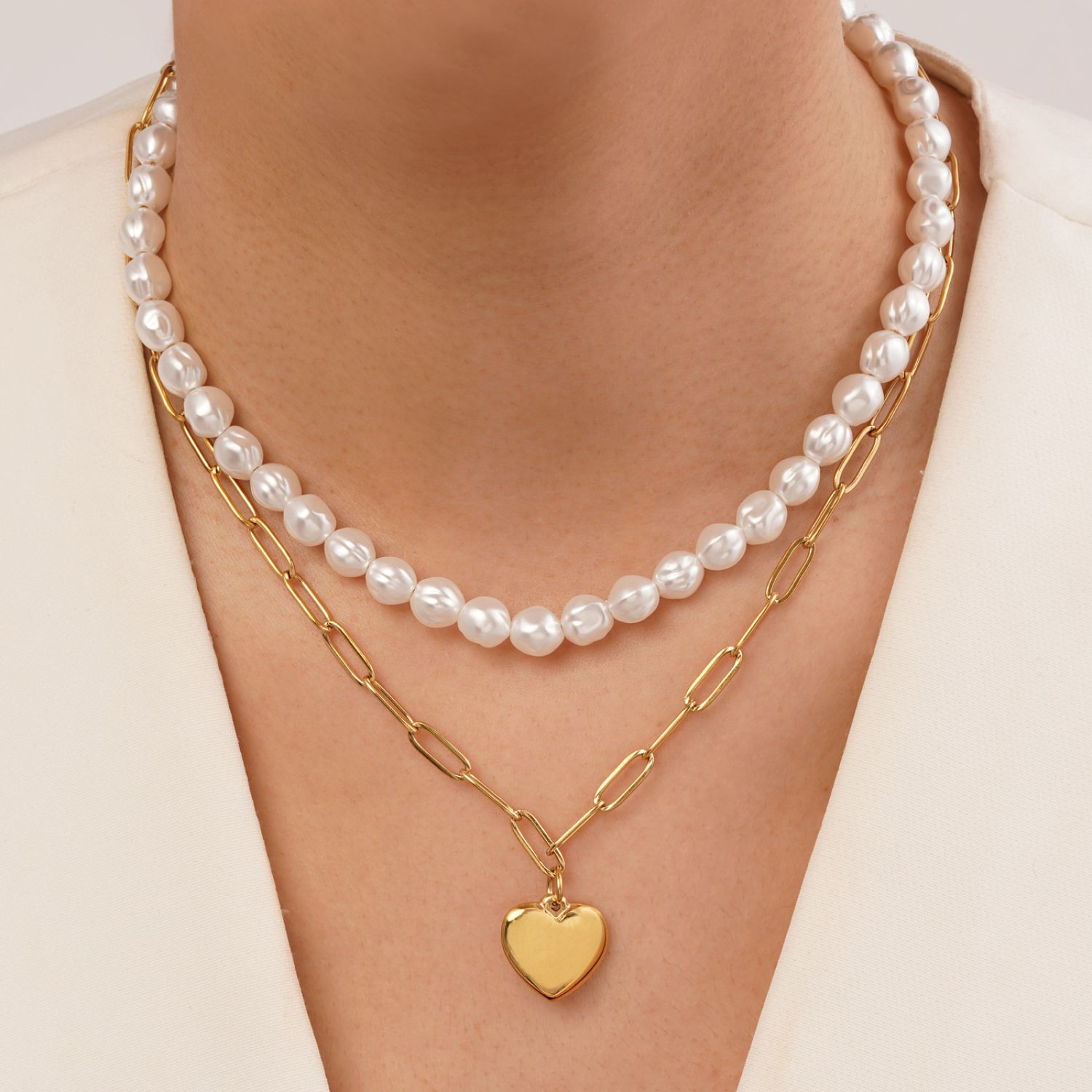 گردنبند استیل 304 قلب مرواریدی طلایی ( 2لاین)