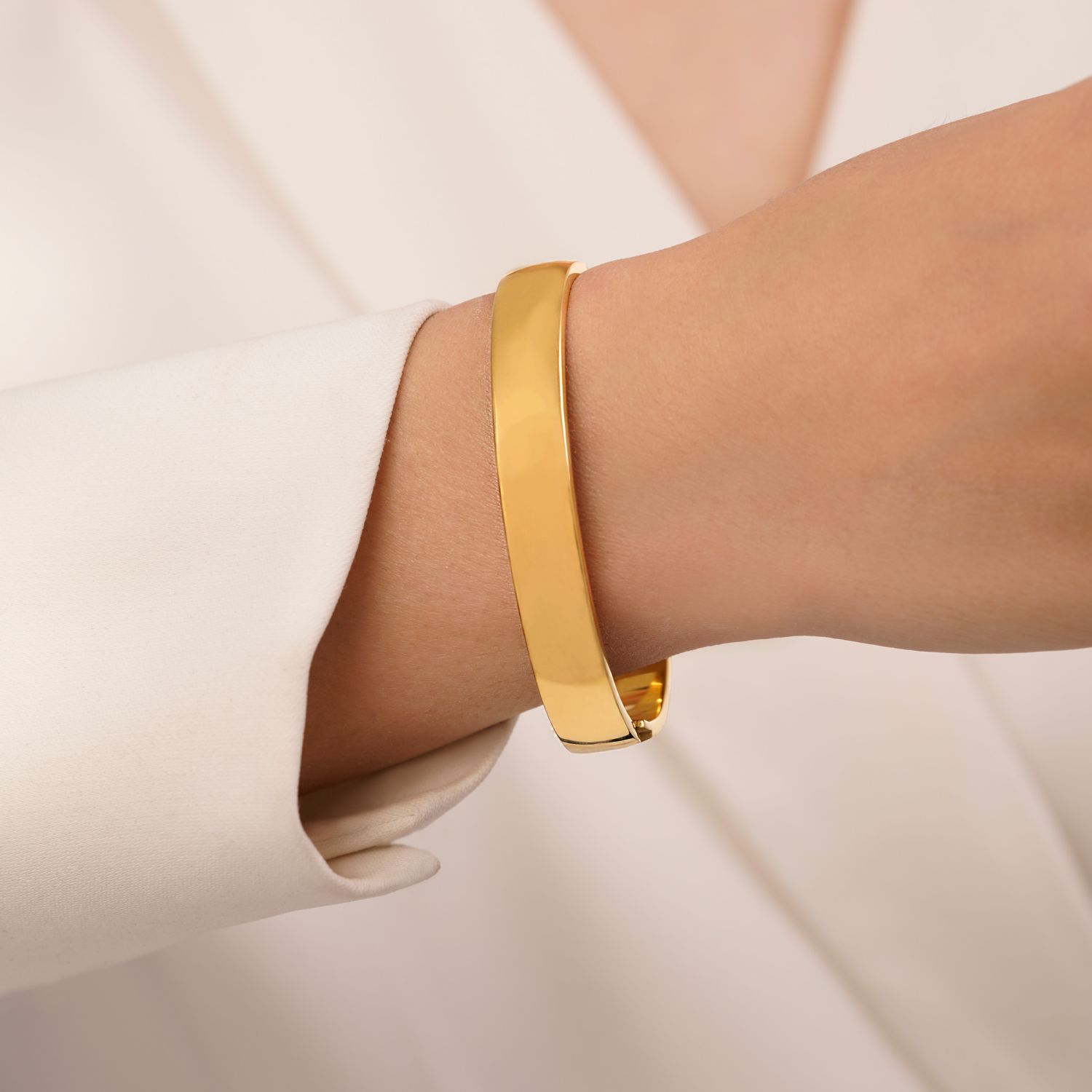 دستبند النگویی استیل 316 طلایی (سایز سه)